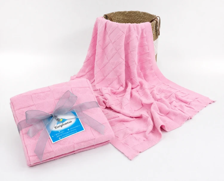 Pastel blanket and wicker basket display.png